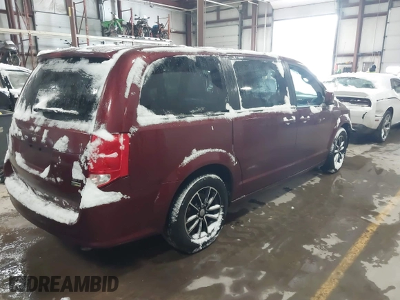 2019 Dodge Grand Caravan GT with VIN 2C4RDGEG3KR535665, listed as a IAAI auction lot 41564437 with 128,016 mi miles and . Bid and sale history available at DreamBid. Image 4.