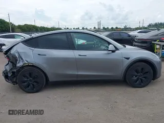 2025 Tesla Model Y Long Range with VIN 7SAYGDED5SF257258, listed as a IAAI auction lot 41877196 with 4,442 mi miles and . Bid and sale history available at DreamBid. Image 13.