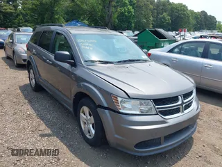 2013 Dodge Journey American Value z VIN 3C4PDCAB0DT691429, wystawiony jako IAAI lot #42514055 z przebiegiem 213 593 mil mil oraz . Historia ofert i sprzedaży dostępna na DreamBid. Obrazek 6.