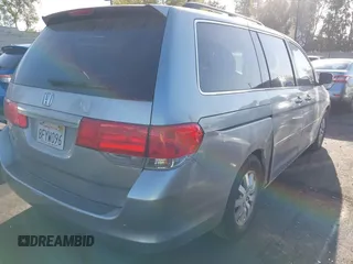 2010 Honda Odyssey EX with VIN 5FNRL3H41AB016671, listed as a IAAI auction lot 42465200 with 167,214 mi miles and . Bid and sale history available at DreamBid. Image 4.