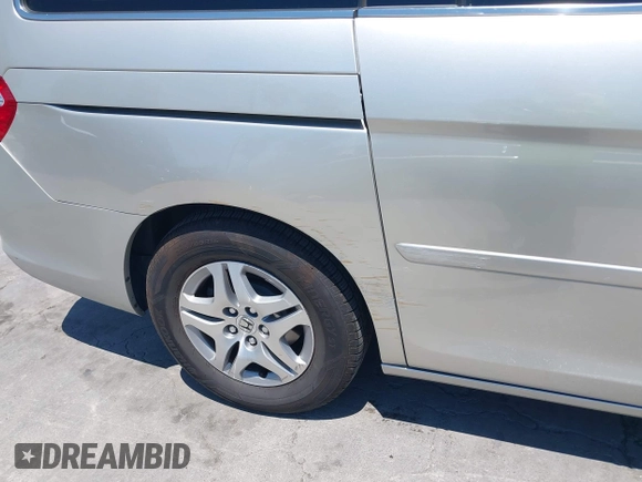 2005 Honda Odyssey EX-L with VIN 5FNRL38725B113815, listed as a IAAI auction lot 42754724 with 179,214 mi miles and . Bid and sale history available at DreamBid. Image 6.