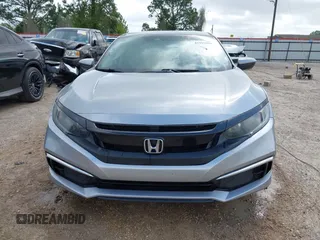 2019 Honda Civic LX with VIN 19XFC2F60KE043806, listed as a IAAI auction lot 41915894 with 123,141 mi miles and . Bid and sale history available at DreamBid. Image 13.