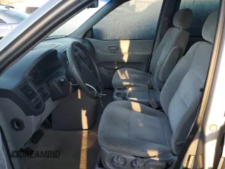2004 Kia Sedona LX with VIN KNDUP131046591151, listed as a Copart auction lot 82201894 with 147,194 mi miles and Salvage Title. Bid and sale history available at carsss.com. Image 7.