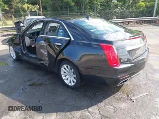 2014 Cadillac CTS RWD with VIN 1G6AP5SX9E0134183, listed as a IAAI auction lot 42190674 with 59,603 mi miles and . Bid and sale history available at DreamBid. Image 3.