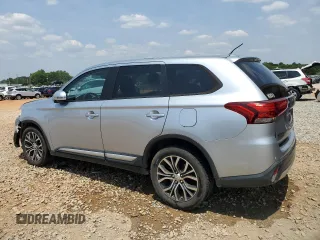 2016 Mitsubishi Outlander SE with VIN JA4AD3A36GZ013709, listed as a Copart auction lot 60262595 with 156,109 mi miles and Salvage title. Bid and sale history available at DreamBid. Image 2.