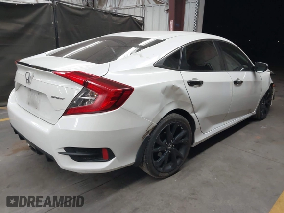 2019 Honda Civic Sport with VIN 19XFC2F86KE022749, listed as a IAAI auction lot 42127993 with 116,279 mi miles and . Bid and sale history available at DreamBid. Image 4.