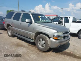 2003 Chevrolet Tahoe LT with VIN 1GNEC13Z13R265773, listed as a IAAI auction lot 42585477 with 229,851 mi miles and . Bid and sale history available at DreamBid. Image 1.