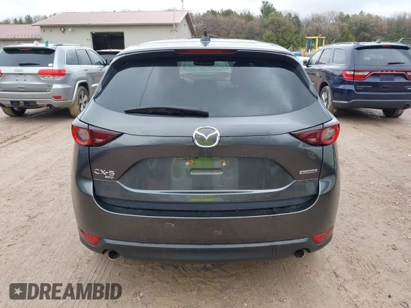 2020 Mazda CX-5 Touring with VIN JM3KFBCM2L0850855, listed as a IAAI auction lot 42147339 with 75,955 mi miles and . Bid and sale history available at carsss.com. Image 16.