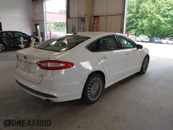2014 Ford Fusion SE with VIN 3FA6P0HD8ER372731, listed as a IAAI auction lot 39915643 with 136,635 mi miles and . Bid and sale history available at DreamBid. Image 4.