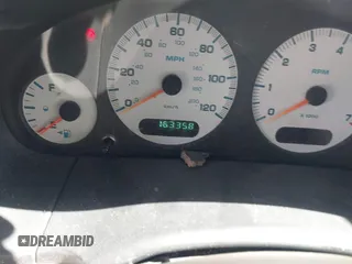 2003 Dodge Grand Caravan with VIN 2D4GP443X3R171373, listed as a IAAI auction lot 41645178 with 163,358 mi miles and . Bid and sale history available at DreamBid. Image 7.