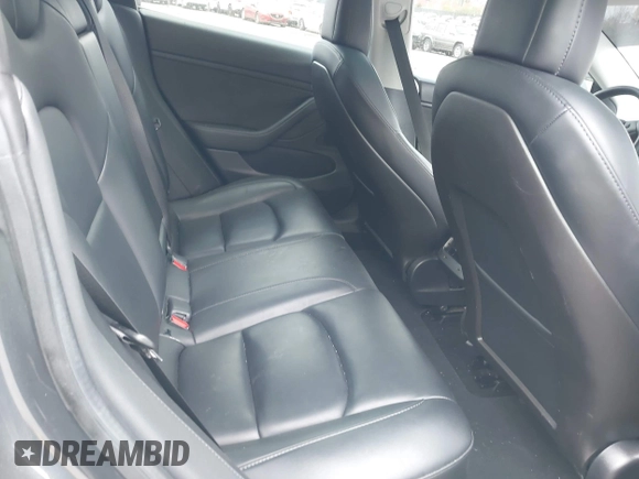 2020 Tesla Model 3 Long Range with VIN 5YJ3E1EB2LF646449, listed as a IAAI auction lot 42059086 with 120,981 mi miles and . Bid and sale history available at DreamBid. Image 8.