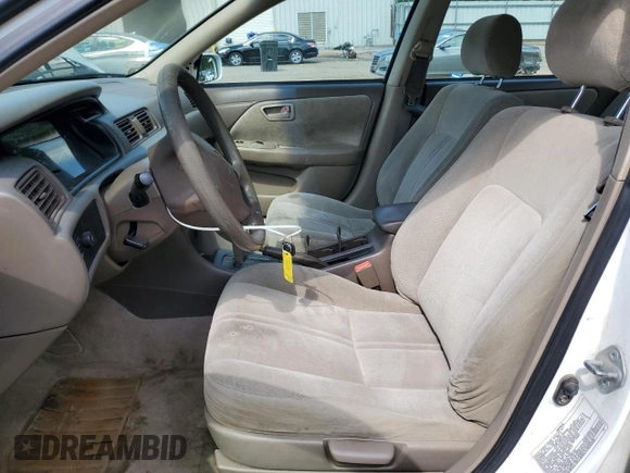 2001 Toyota Camry CE z VIN 4T1BG22K11U848960, wystawiony jako Copart lot #57259655 z przebiegiem 219 477 mil mil oraz Szkoda całkowita • Salvage title. Historia ofert i sprzedaży dostępna na DreamBid. Obrazek 7.