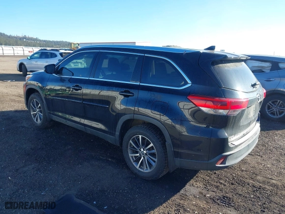 2019 Toyota Highlander SE with VIN 5TDJZRFH3KS580338, listed as a IAAI auction lot 41736059 with 128,487 mi miles. Bid and sale history available at carsss.com. Image 3.