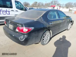 2002 Lexus ES 300 with VIN JTHBF30GX20066997, listed as a IAAI auction lot 41382708 with 142,135 mi miles. Bid and sale history available at carsss.com. Image 4.