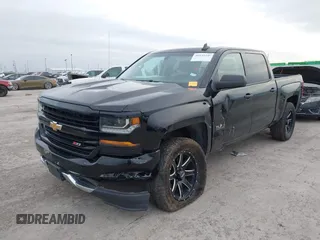 2017 Chevrolet Silverado 1500 LT with VIN 1GCUKREC2HF208232, listed as a IAAI auction lot 40933445 with 105,928 mi miles and . Bid and sale history available at DreamBid. Image 17.