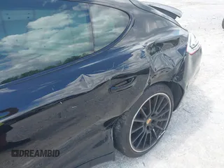 2016 Porsche Panamera 4 z VIN WP0AA2A71GL001210, wystawiony jako IAAI lot #42230574 z przebiegiem Nie podano mil oraz . Historia ofert i sprzedaży dostępna na DreamBid. Obrazek 6.