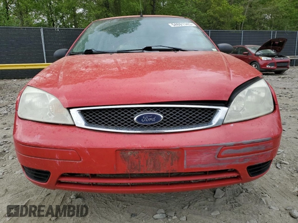 2007 Ford Focus S with VIN 1FAFP31N57W242751, listed as a Copart auction lot 54691345 with 137,224 mi miles and Salvage title. Bid and sale history available at DreamBid. Image 5.