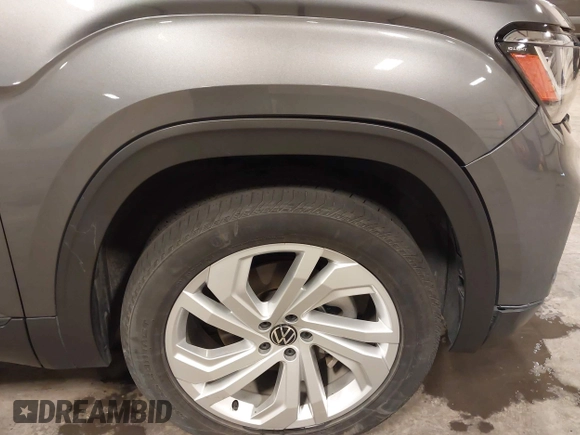 2021 Volkswagen Atlas SE z VIN 1V2KR2CA5MC606590, wystawiony jako IAAI lot #42383813 z przebiegiem 45 087 mil mil oraz . Historia ofert i sprzedaży dostępna na DreamBid. Obrazek 20.