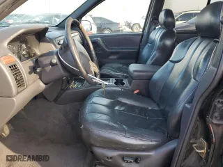 1999 Jeep Grand Cherokee Laredo with VIN 1J4GW58N1XC737706, listed as a Copart auction lot 83107914 with 0 mi miles and Salvage Title. Bid and sale history available at carsss.com. Image 7.