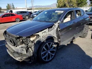 2018 BMW X2 sDrive28i with VIN WBXYJ3C36JEP76244, listed as a Copart auction lot 38732563 with 50,424 mi miles. Bid and sale history available at carsss.com. Image 1.