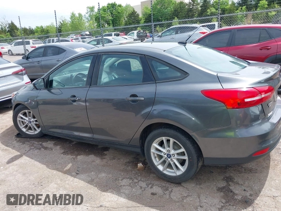 2018 Ford Focus SE with VIN 1FADP3F20JL312395, listed as a IAAI auction lot 42110335 with 110,720 mi miles and . Bid and sale history available at DreamBid. Image 14.