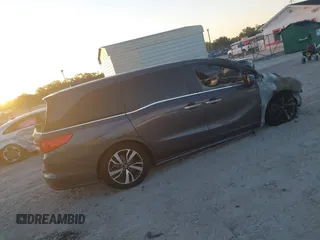 2023 Honda Odyssey Touring with VIN 5FNRL6H84PB053582, listed as a IAAI auction lot 42012108 with Not Provided miles and . Bid and sale history available at DreamBid. Image 4.