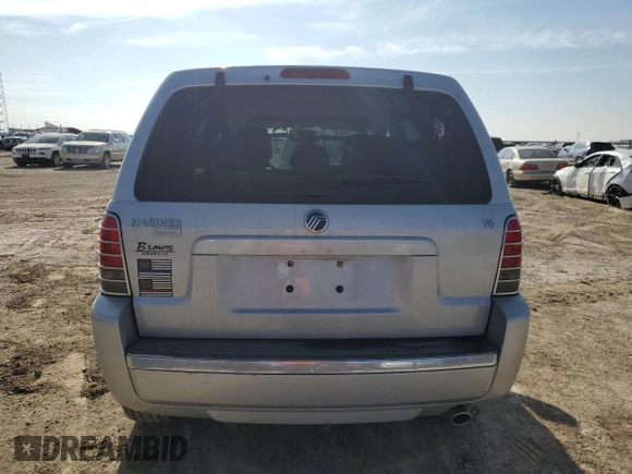 2005 Mercury Mariner Luxury z VIN 4M2YU56195DJ03528, wystawiony jako Copart lot #83315034 z przebiegiem 118 696 mil mil oraz Szkoda całkowita • Salvage title. Historia ofert i sprzedaży dostępna na DreamBid. Obrazek 6.