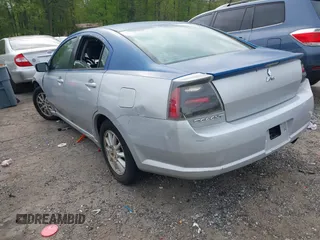 2005 Mitsubishi Galant ES z VIN 4A3AB36F95E062063, wystawiony jako IAAI lot #41992669 z przebiegiem 201 416 mil mil oraz . Historia ofert i sprzedaży dostępna na DreamBid. Obrazek 3.