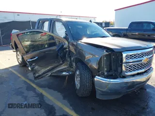 2014 Chevrolet Silverado 1500 LT with VIN 1GCRCREH5EZ165367, listed as a IAAI auction lot 41076729 with 130,425 mi miles and . Bid and sale history available at DreamBid. Image 1.