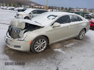 2014 Cadillac XTS Luxury z VIN 2G61M5S37E9304598, wystawiony jako IAAI lot #41006051 z przebiegiem 115 879 mil mil oraz . Historia ofert i sprzedaży dostępna na DreamBid. Obrazek 18.