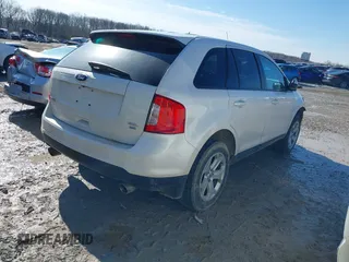 2013 Ford Edge SEL with VIN 2FMDK4JC9DBC64071, listed as a IAAI auction lot 41864334 with 104,942 mi miles. Bid and sale history available at carsss.com. Image 4.