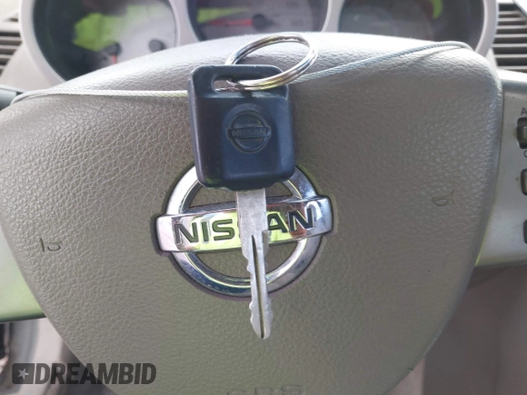 2004 Nissan Maxima SE with VIN 1N4BA41E74C858809, listed as a IAAI auction lot 42436562 with 198,105 mi miles and . Bid and sale history available at DreamBid. Image 11.