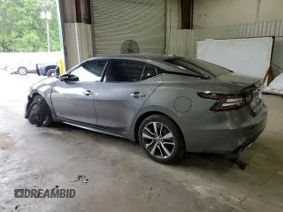 2020 Nissan Maxima SV z VIN 1N4AA6CVXLC369534, wystawiony jako Copart lot #55363295 z przebiegiem 98 438 mil mil oraz Szkoda całkowita • Salvage title. Historia ofert i sprzedaży dostępna na DreamBid. Obrazek 2.