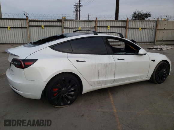 2022 Tesla Model 3 Performance with VIN 5YJ3E1EC3NF265334, listed as a Copart auction lot 84853734 with Not Provided miles and Salvage Title. Bid and sale history available at DreamBid. Image 3.