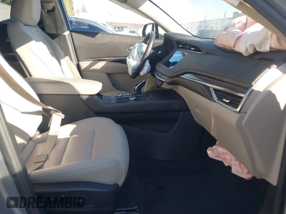 2023 Cadillac XT4 FWD Luxury with VIN 1GYAZAR43PF185264, listed as a IAAI auction lot 40659418 with 11,666 mi miles. Bid and sale history available at carsss.com. Image 5.