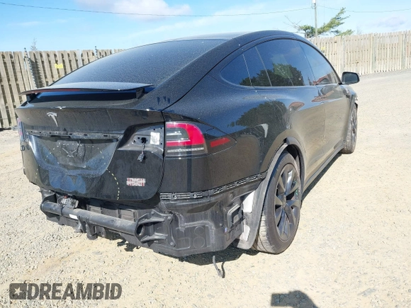 2022 Tesla Model X with VIN 7SAXCAE59NF346186, listed as a IAAI auction lot 41893923 with Not Provided miles and . Bid and sale history available at DreamBid. Image 4.