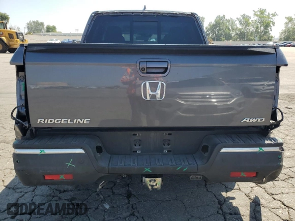 2019 Honda Ridgeline RTL-E with VIN 5FPYK3F73KB016675, listed as a Copart auction lot 55340905 with 69,571 mi miles and Salvage title. Bid and sale history available at DreamBid. Image 6.