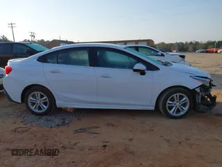 2017 Chevrolet Cruze LT z VIN 1G1BE5SM0H7235078, wystawiony jako IAAI lot #41734625 z przebiegiem 140 548 mil mil oraz . Historia ofert i sprzedaży dostępna na DreamBid. Obrazek 13.