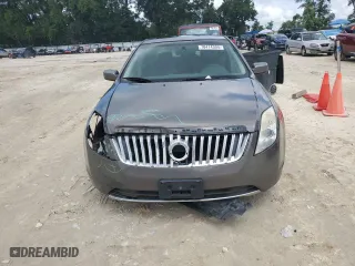 2010 Mercury Milan with VIN 3MEHM0HAXAR636042, listed as a Copart auction lot 70414394 with 118,524 mi miles and Salvage Title. Bid and sale history available at carsss.com. Image 5.