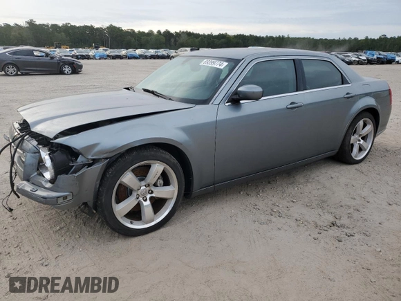 2006 Chrysler 300 C SRT8 with VIN 2C3KA73W06H372249, listed as a Copart auction lot 69399774 with 112,872 mi miles and Salvage Title. Bid and sale history available at carsss.com. Image 1.
