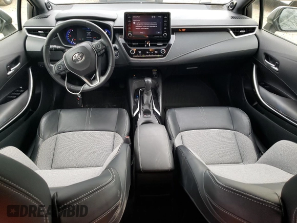 2019 Toyota Corolla Hatchback SE with VIN JTNK4RBEXK3051691, listed as a Copart auction lot 77159164 with 21,051 mi miles and Salvage Title. Bid and sale history available at carsss.com. Image 8.