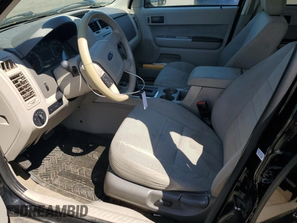 2010 Ford Escape Hybrid with VIN 1FMCU4K38AKC98072, listed as a Copart auction lot 58192375 with 123,958 mi miles and Salvage title. Bid and sale history available at DreamBid. Image 7.