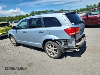 2013 Dodge Journey Crew with VIN 3C4PDCDG5DT599840, listed as a Copart auction lot 62542795 with 102,235 mi miles and Salvage title. Bid and sale history available at DreamBid. Image 2.