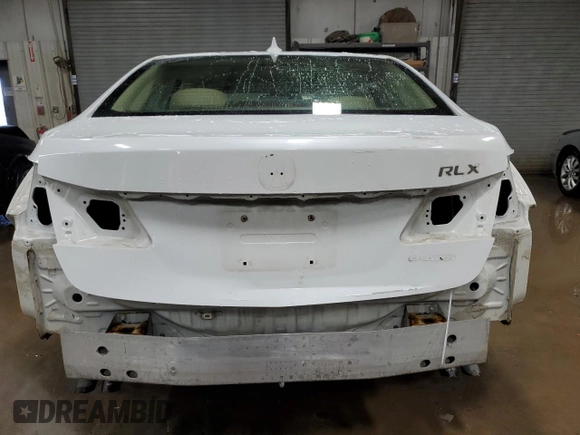 2014 Acura RLX Technology z VIN JH4KC1F58EC007386, wystawiony jako Copart lot #85366634 z przebiegiem 124 832 mil mil oraz Szkoda całkowita • Salvage title. Historia ofert i sprzedaży dostępna na DreamBid. Obrazek 6.