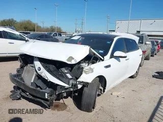 2016 Kia Optima SX Turbo with VIN 5XXGW4L22GG017084, listed as a IAAI auction lot 41794900 with 151,447 mi miles and . Bid and sale history available at carsss.com. Image 17.