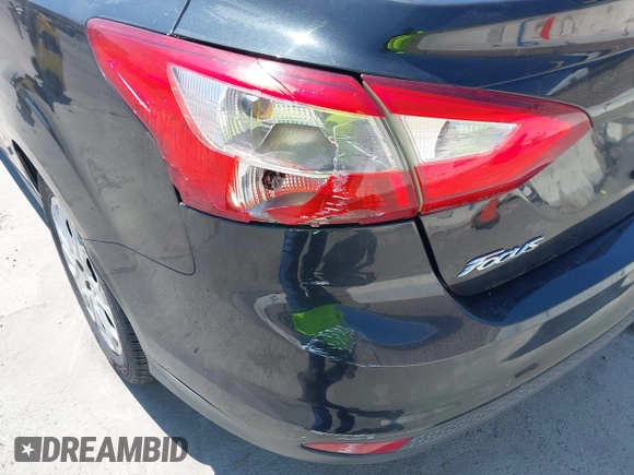 2012 Ford Focus SE with VIN 1FAHP3F24CL471005, listed as a IAAI auction lot 42726292 with 162,750 mi miles and . Bid and sale history available at DreamBid. Image 6.