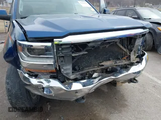 2016 Chevrolet Silverado 1500 LT with VIN 3GCUKRECXGG359705, listed as a IAAI auction lot 41644633 with 157,957 mi miles and . Bid and sale history available at DreamBid. Image 6.
