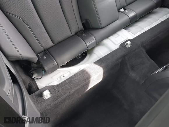 2022 BMW 4 Series 430i xDrive with VIN WBA73AP09NCJ28175, listed as a IAAI auction lot 41486064 with 27,312 mi miles and . Bid and sale history available at DreamBid. Image 8.