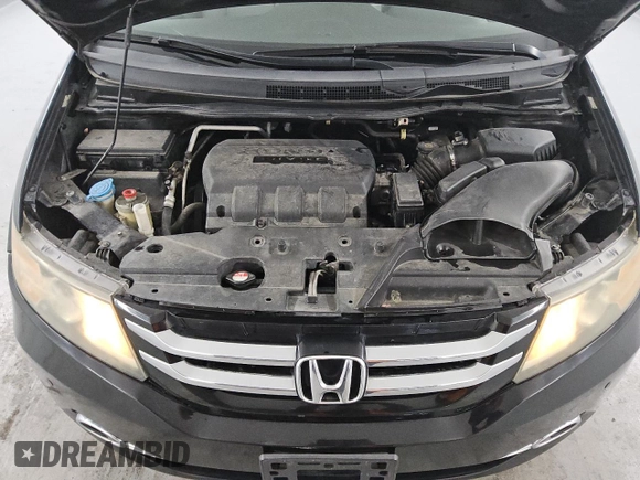 2015 Honda Odyssey Touring Elite with VIN 5FNRL5H95FB017434, listed as a Copart auction lot 55011035 with 111,254 mi miles and Clean title. Bid and sale history available at DreamBid. Image 12.