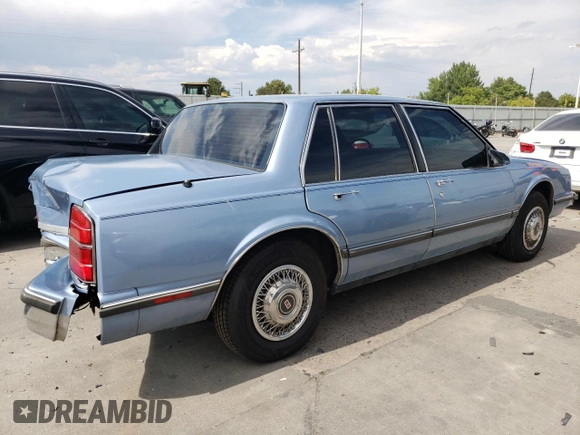 1989 Oldsmobile Delta z VIN 1G3HN54C8KH301125, wystawiony jako Copart lot #70709764 z przebiegiem 87 068 mil mil oraz Tytuł czysty. Historia ofert i sprzedaży dostępna na DreamBid. Obrazek 3.